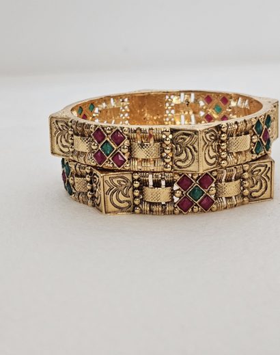 Gold Bangle With X Shape Green and Red Stone